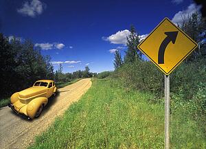 Vintage automobile on gravel road