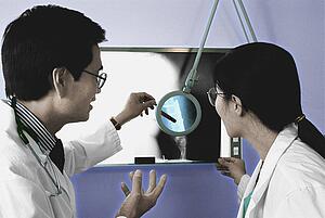 Doctors examining an x-ray