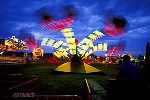 Time delay of amusement park ride at evening