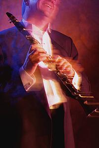 Man with soprano saxophone