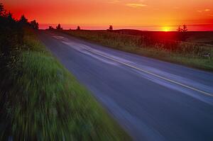 Moving at speed down country road