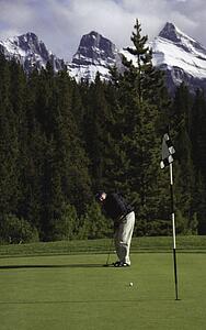 Man playing golf