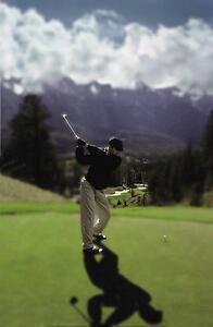 Man driving golf ball