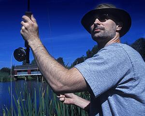 man fly fishing