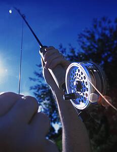 Man holding fishing rod