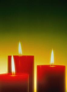 Three lit candles