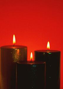 Three lit candles