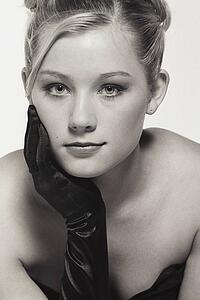 Young woman with black glove