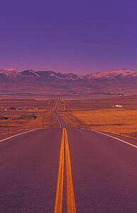 Two lane highway going down into valley