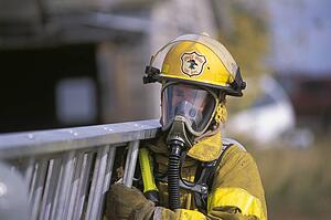 Fireman carrying ladder