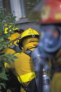 Firemen walking to building
