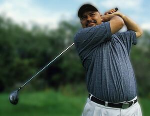 Man swinging golf club
