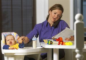 Young mother working from home