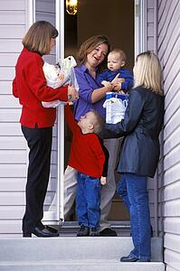 Group of women friends chatting on the doorstep