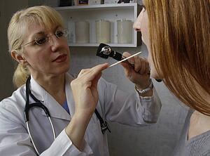 Doctor examining patient