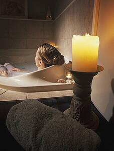 Woman relaxing in hot tub