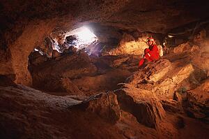 Cave interior and woman caver