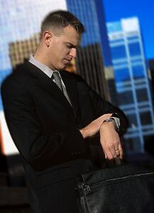 Man looking at watch