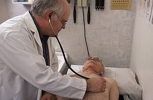 Doctor examining patient