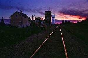 Grain elevators at sunset