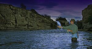 Man fly fishing in stream