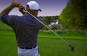 Follow through of golfer's tee shot