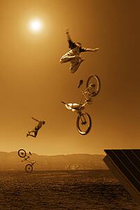 Two cyclists jumping off ramp into water