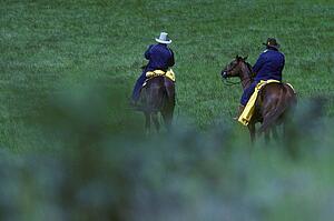 Confederate soldiers on horseback