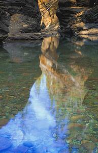 Shallow mountain river with rocky bed