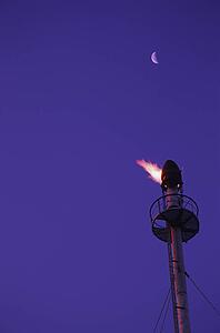 Flame on tower at gas plant
