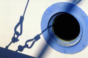 Porthole and shadow of stays rigging on white boat