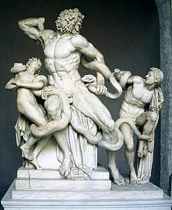 Statue of man fighting snake