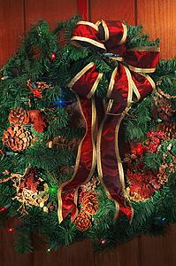 Christmas wreath with pinecones and bow