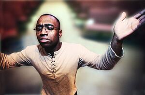 Man with hands raised in worship