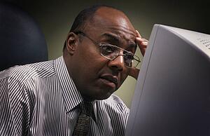 Businessman in front of computer screen