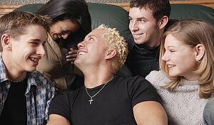 Group of young people laughing together
