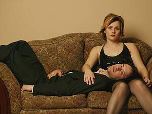 Couple hang out on the sofa