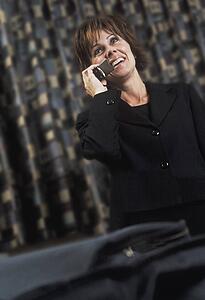 Businesswoman having fun phone conversation