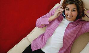 Woman talks on cell phone