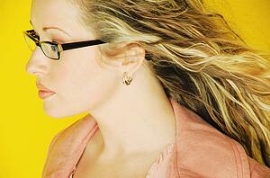 Model wearing trendy glasses