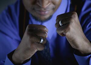 Businessman with fighter's stance