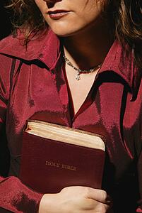 Woman holding Bible