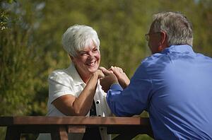 Couple holds hands