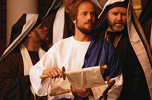 Jesus reads from the scroll