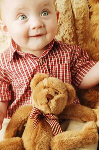 Baby with a teddy bear