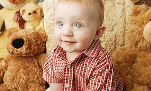 Cute baby with teddy bear
