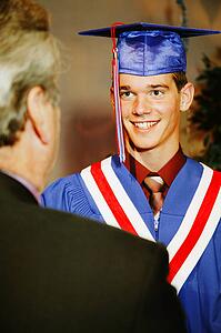 Graduate receiving diploma