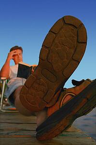 Reading a book at the lake