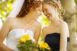 Bride and bridesmaid share memories