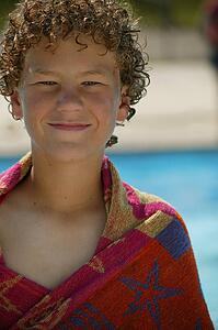 Child with a beach towel
